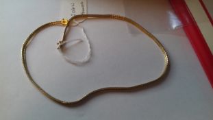 14K gold flexible link necklace, having rectangular textured links,