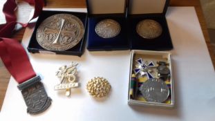 Collection of enamel and other badges to include silver fobs, ERII Cadet Forces medal and miniature,