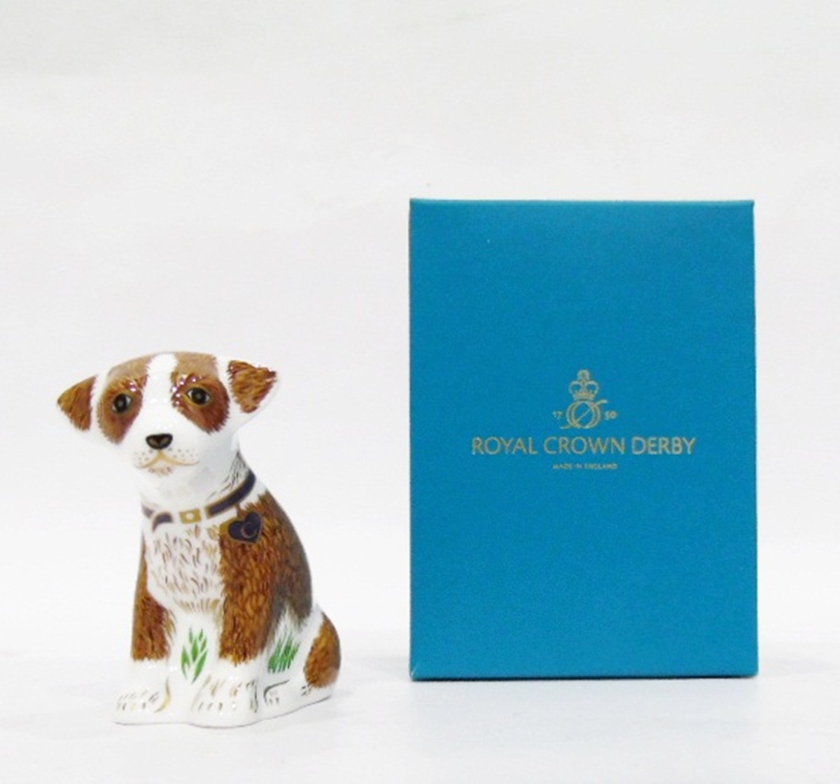 Royal Crown Derby charity paperweight entitled "Colin the Puppy",