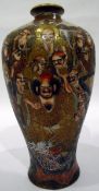 Japanese pottery Satsuma baluster-shaped vase depicting figures in landscape and central character