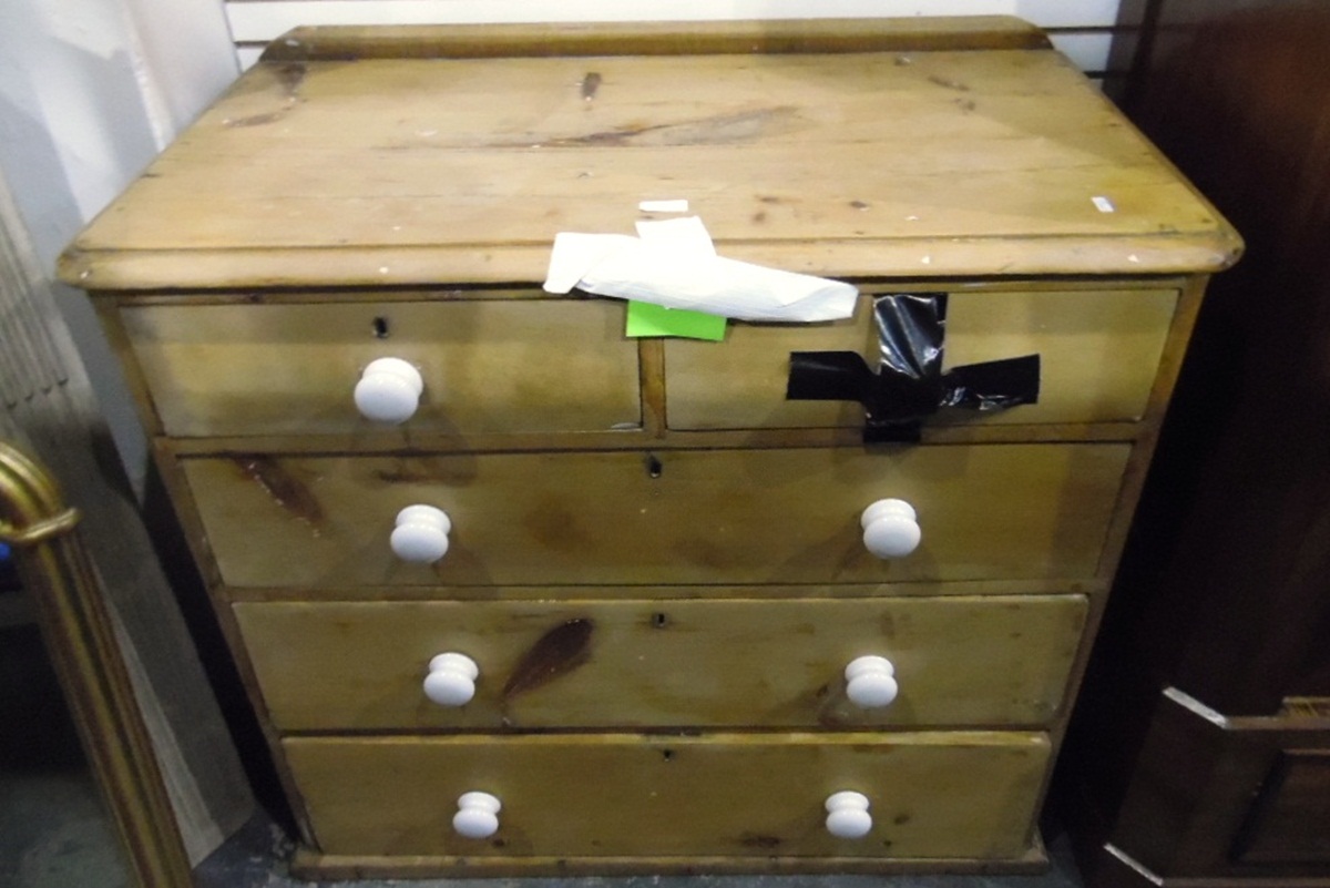 19th century pine chest of two short and three long drawers, with ceramic handles,