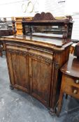 Regency/early Victorian mahogany chiffoniere, the shallow mirror back with carved cresting,