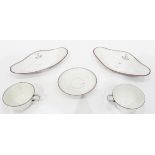 Quantity of monogrammed china to include a set of 11 fine porcelain teacups,