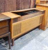 1970's teak music cabinet containing a Bush transistor radio and a Garrard record player,