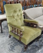 Late 19th/early 20th century open armchair, the green upholstery with button back,