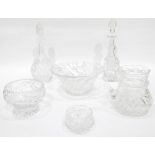 Cut glass fruit bowl, two cut glass decanters,