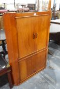 Mid 20th century corner drinks cabinet with fall front,