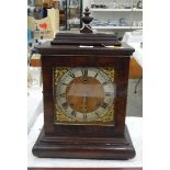 Regency-style mahogany bracket clock with urn finial,