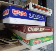 Assorted boxed games including Blockbusters, Campaign,