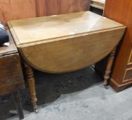 Victorian mahogany drop-flap dining table with moulded edge, frieze drawer,