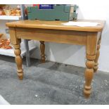 Modern pine kitchen table on turned supports,