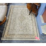 Modern Aubusson-style rug with circular medallion and scrollwork, on an ivory ground,