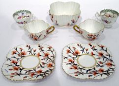 19th century porcelain part tea service having green chequerboard pattern to scalloped rim,