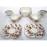 19th century porcelain part tea service having green chequerboard pattern to scalloped rim,