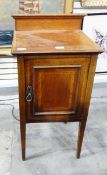 Edwardian mahogany bedside cabinet with crossbanded decoration and single cupboard door,