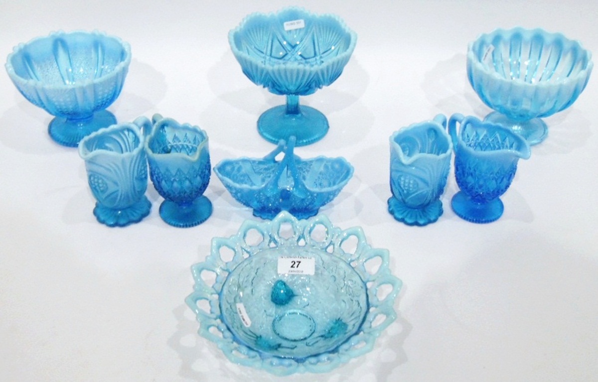 Large quantity of blue pressed glass with opalescent rims, including comports, pedestal bowls,