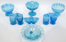 Large quantity of blue pressed glass with opalescent rims, including comports, pedestal bowls,