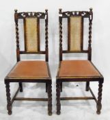 Set of four oak dining chairs with carved and cane backs (4)