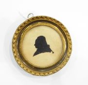 Late 18th/early 19th century silhouette portrait of a gentleman's head and shoulders, circular, 6.