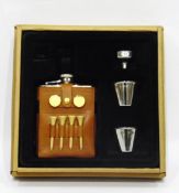 Gentleman's modern golf set comprising a leather bound hip flask with tees, markers,
