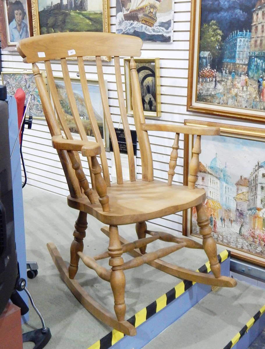 Modern high back Windsor rocking chair with outswept arms