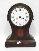 Inlaid mahogany balloon-shaped mantel clock with fan patera below the dial,