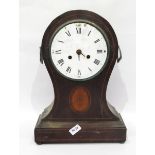 Inlaid mahogany balloon-shaped mantel clock with fan patera below the dial,