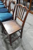 Single 19th century elm dining chair with rail back and dished panel seat