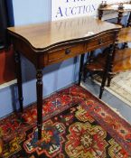 Reproduction mahogany fold-out card table with dummy drawers below, on turned reeded supports,