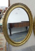 Modern oval gilt framed mirror,