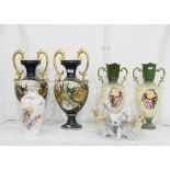 Pair of Edwardian pottery vases with green ground, baluster-shaped with scroll gilt handles,