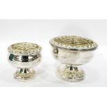 Pair of silver plated rose bowls of two sizes, decorated with a floral border, 10.