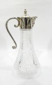 Silver plated mounted and glass claret jug with a mask decorated spout, scroll handle,