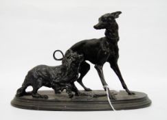 P J Mene style cast iron group of two dogs, a whippet and a spaniel, the oval base fan decorated,