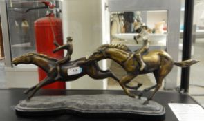 20th century bronzed-finish polo group of two riders on a metal base,