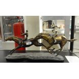 20th century bronzed-finish polo group of two riders on a metal base,