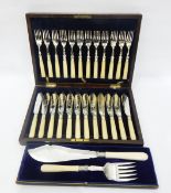 Set of 12 EPNS fish eaters in a wooden case and a pair of fish servers,
