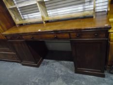 Early 19th century mahogany sideboard of plain rectangular form fitted with one long and two short