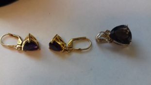 Pair of silver-gilt and amethyst-coloured drop earrings,