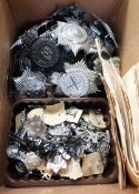 Large collection of Police helmet plates and cap badges ( 1 box)