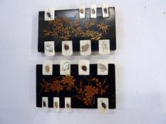 Two Japanese shibayama wood and inlaid ivory whist markers, worked with birds,