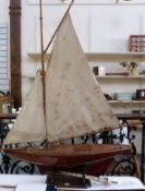 Late Victorian/Edwardian wooden pond yacht "Gauntlet", with mast and sails,