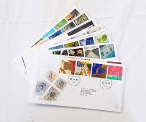 Quantity of First Day Covers to include GB circa 1970's, 1980's, GB pre-war to 1990 stamps in album,