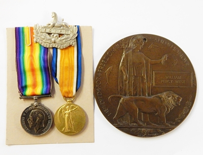 WWI War medal and Victory medal named to "18423. PTE. W.P. WEST. GLOUC.R".
