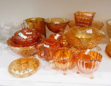 Large quantity of carnival glass including a marigold carnival glass butter dish and cover,