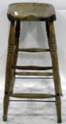 Old high stool with shaped seat,