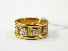 Gold coloured metal & diamond ring, set with 9 diamonds,