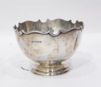 Early 20th century silver bowl with wavy rim, circular pedestal base, Birmingham 1939,