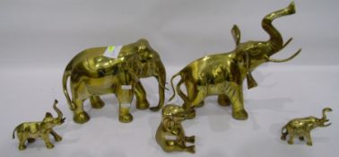 Five brass elephants of varying sizes