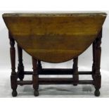 Light oak oval-top gateleg table with moulded edge top, on turned legs united by stretchers,